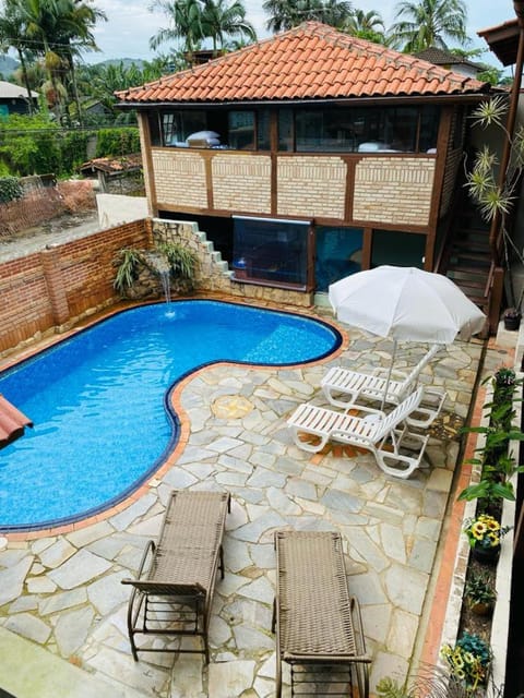 Property building, Day, Pool view, sunbed