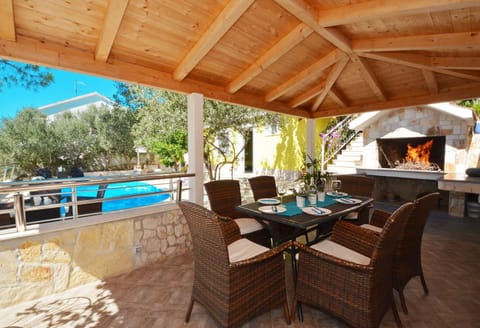 Patio, BBQ facilities, Garden, Pool view, Sea view, Swimming pool