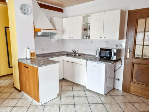 Kitchen or kitchenette, stove, toaster