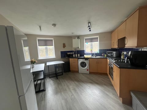 Kitchen or kitchenette, oven, pet friendly, stove, washing machine, dryer