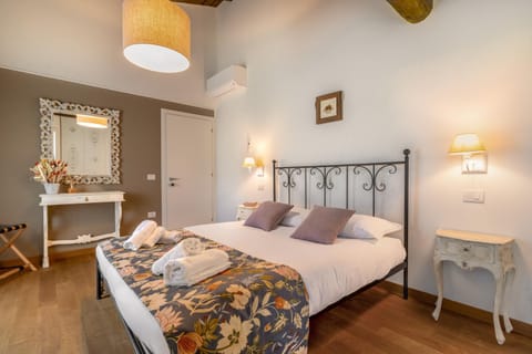 Bed, Photo of the whole room, Bedroom, towels, air conditioner