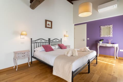 Bed, Photo of the whole room, Bedroom, towels, air conditioner