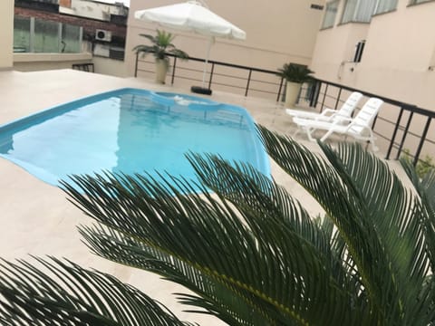 Swimming pool, sunbed