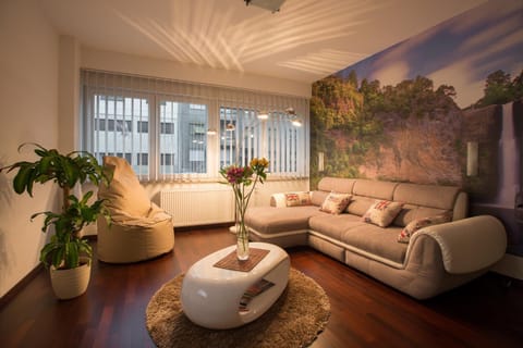 Bed, Living room, Seating area, City view