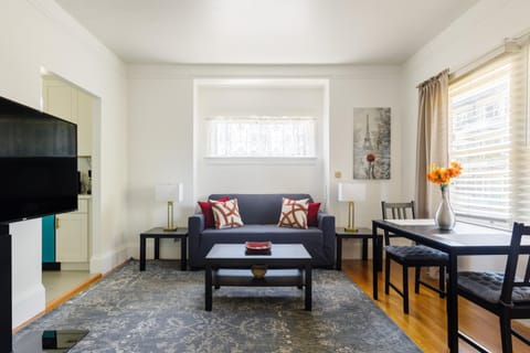 Bed, TV and multimedia, Living room, Seating area, Dining area