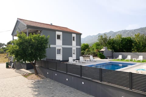 Apartments Zanic with private swimming pool and sea view Condo in Seline