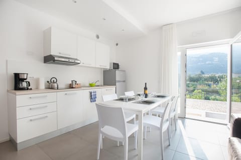 Appartamenti Villa al Fiume Condo in Nago–Torbole