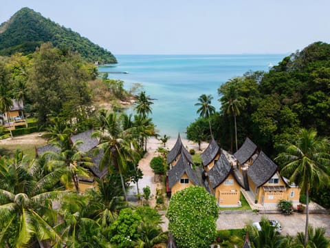 Property building, Nearby landmark, Day, Natural landscape, Beach, Mountain view