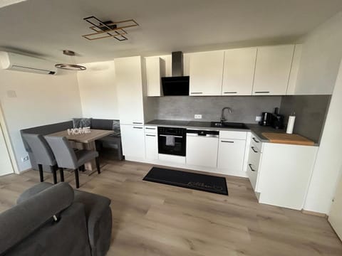 Kitchen or kitchenette, Dining area, dishwasher, oven, stove, toaster