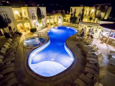 Property building, Night, Pool view, Swimming pool, sunbed