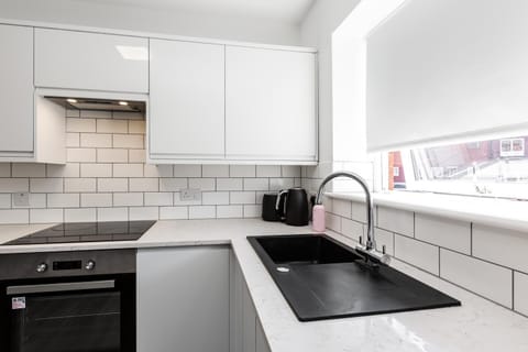 Kitchen or kitchenette, stove, toaster