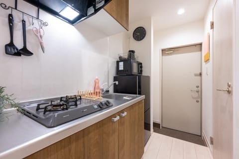 Kitchen or kitchenette, stove