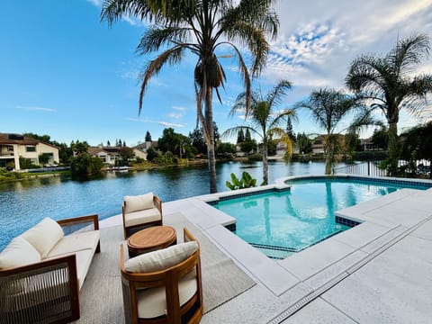 Experience Serenity Luxe 4BDR Lake House 25ft Pool House in Elk Grove
