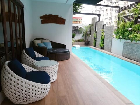 Patio, Seating area, Pool view, Swimming pool