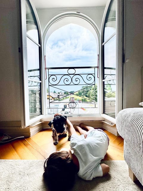 Natural landscape, View (from property/room), Living room, Seating area, Pets