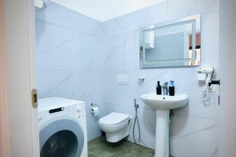Bathroom, towels, washing machine, dryer