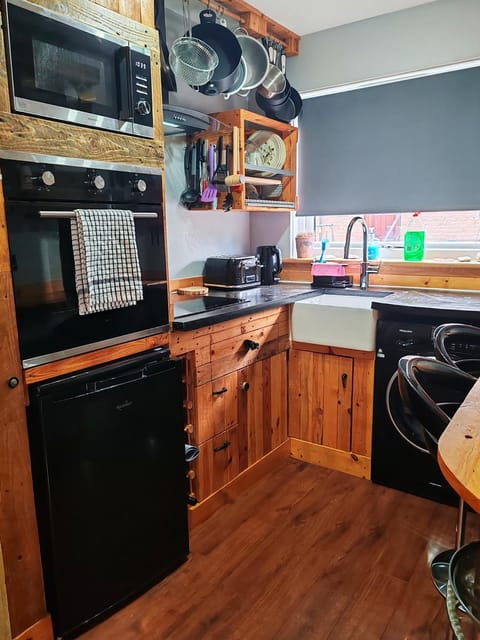 Kitchen or kitchenette, oven, stove