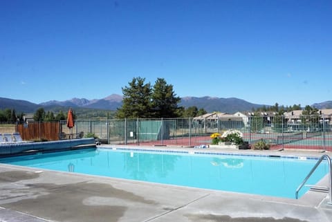 Outdoor Pool, Fireplace, Athletic Club, Covered Balcony with Views Apartment in Fraser