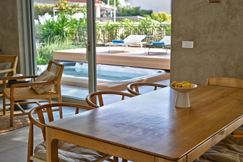 Living room, Dining area, Pool view