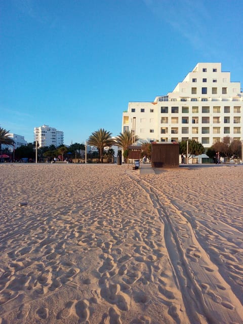 Property building, Nearby landmark, Beach