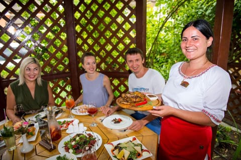 Staff, group of guests