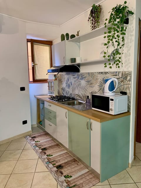 Kitchen or kitchenette, stove