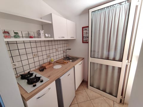 Kitchen or kitchenette, stove