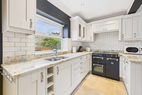 Kitchen or kitchenette, stove, toaster