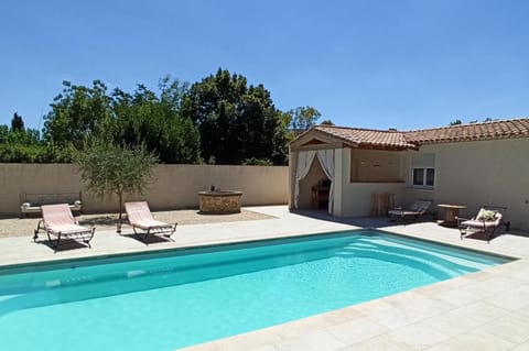 Property building, Patio, Pool view, Swimming pool, sunbed
