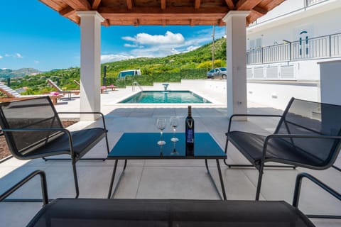 Patio, Day, Seating area, Pool view