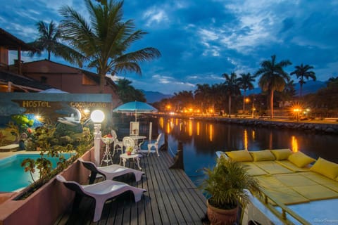 Property building, Patio, Swimming pool, Sunset