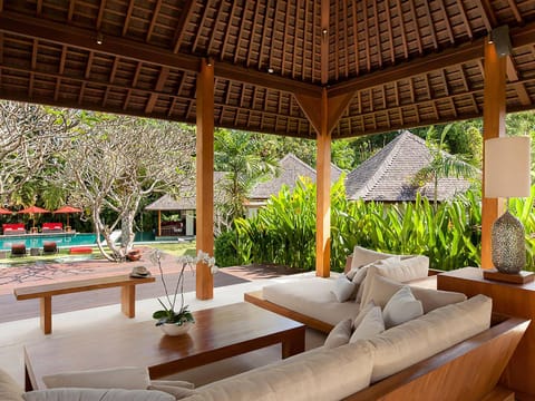 Living room, Seating area, Garden view, Pool view