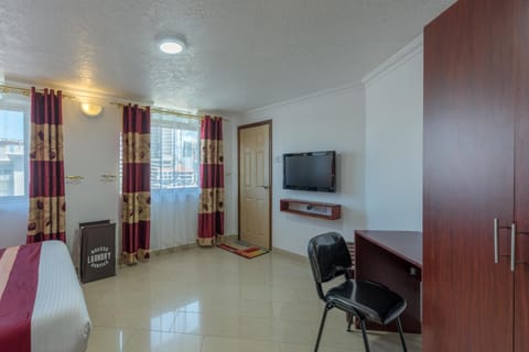 TV and multimedia, Seating area, Bedroom, City view, hair dresser, wardrobe, air conditioner