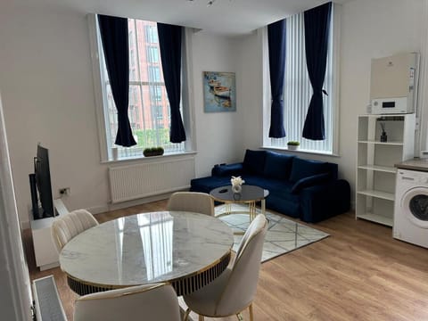 Living room, Seating area, Dining area, oven, washing machine, dryer