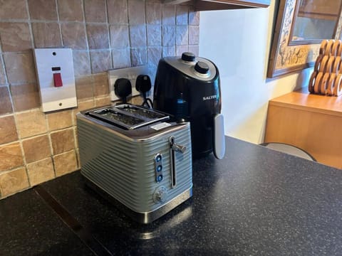 Kitchen or kitchenette, toaster