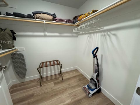 flat iron, furniture, towels, wardrobe