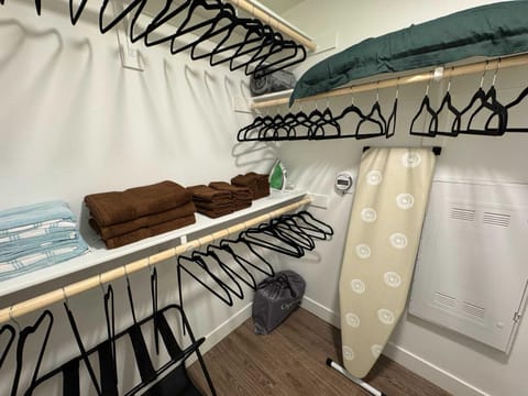 flat iron, towels, wardrobe