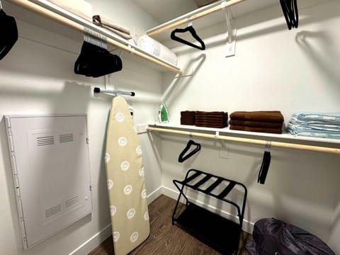 flat iron, furniture, towels, wardrobe