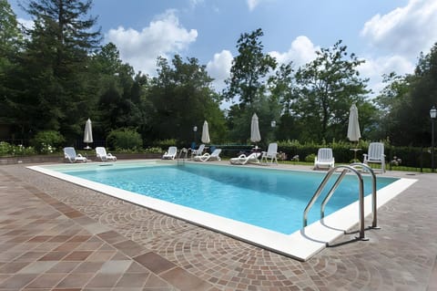 Property building, Living room, Swimming pool