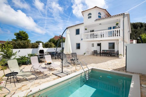 Property building, Patio, Day, View (from property/room), Balcony/Terrace, Pool view, Swimming pool, sunbed