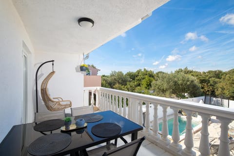Patio, Day, View (from property/room), Balcony/Terrace, Dining area, Pool view, Swimming pool