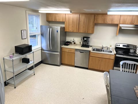 Kitchen or kitchenette, dishwasher, stove, toaster