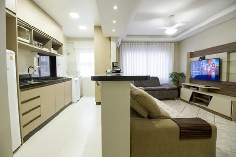 Communal lounge/ TV room, TV and multimedia, Kitchen or kitchenette, Living room, Seating area, Evening entertainment, fireplace, minibar, laundry, kitchen, air conditioner