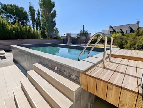 Property building, Living room, Swimming pool