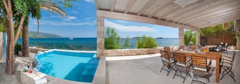 Property building, Patio, Day, Natural landscape, Summer, View (from property/room), Balcony/Terrace, Dining area, Beach, Mountain view, Pool view, Sea view, Sea view, Swimming pool, sunbed