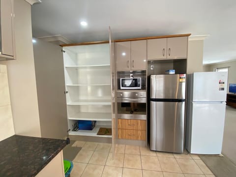 Kitchen or kitchenette, microwave, oven