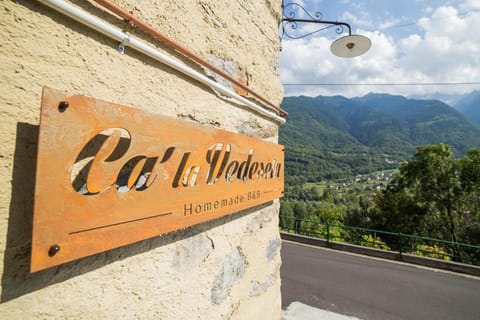 Day, Property logo or sign, Natural landscape, Mountain view