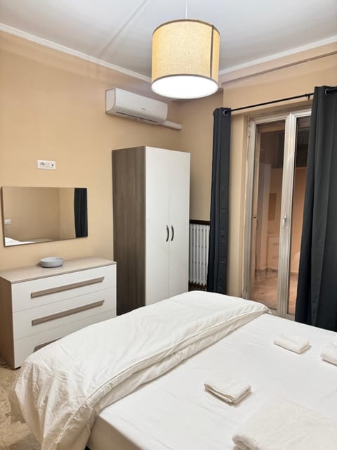 Bed, wardrobe, air conditioner