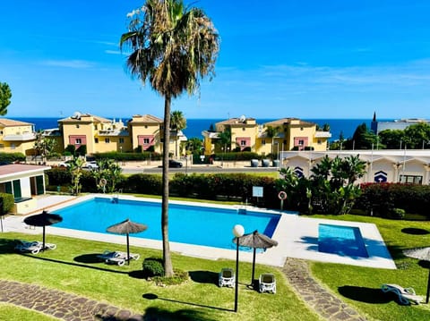 View (from property/room), Pool view, Sea view, Swimming pool