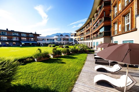 Property building, Patio, Garden, Garden view, sunbed